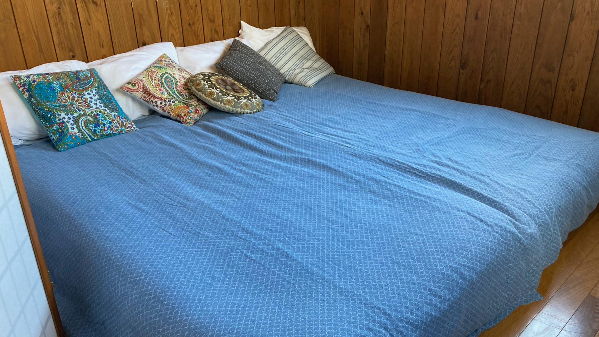 Comfortable king-size bed at Soma Ecolodge